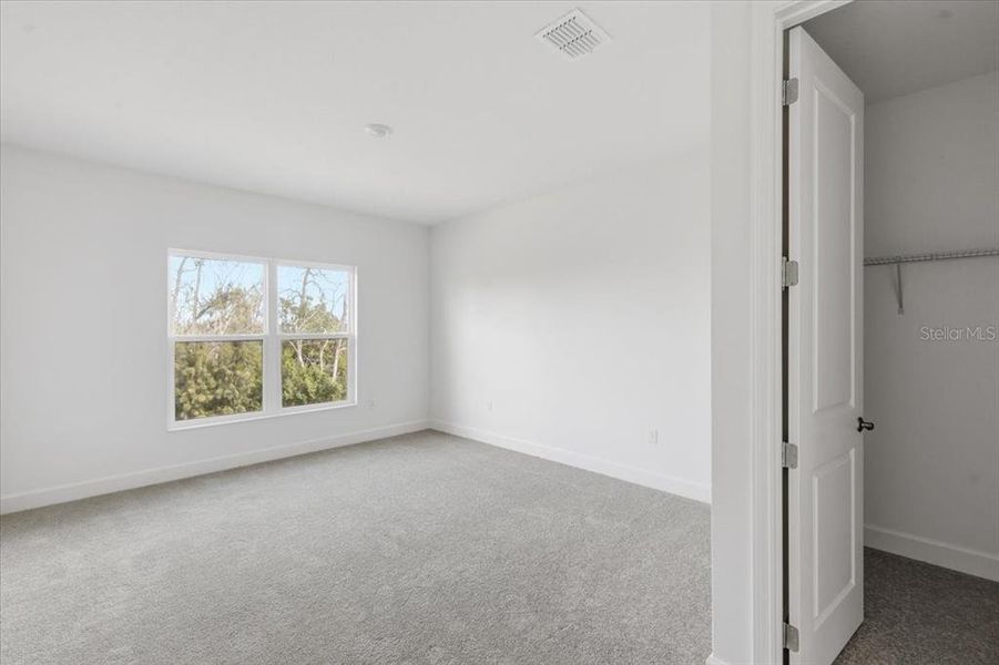 Spacious, unfurnished interior of a new home in Marisol Pointe at MiraBay, Apollo Beach (Image 10).