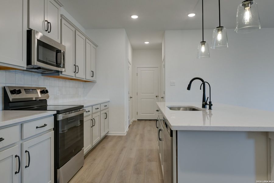 Furnished interior view inside a new home in Hennersby Hollow, San Antonio (Image 12).