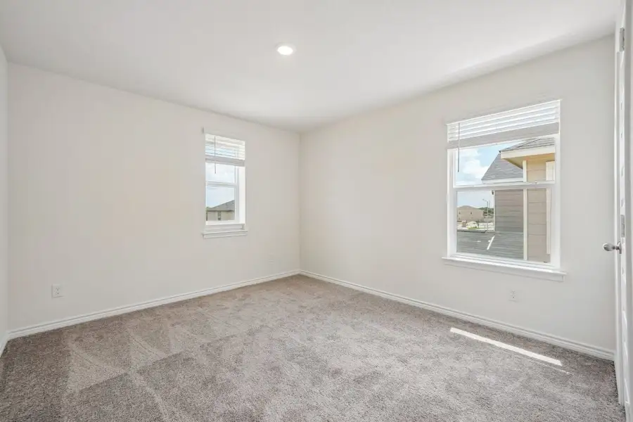 Spacious, unfurnished interior of a new home in Preserve at Culebra - Sterling Collection, San Antonio (Image 27).