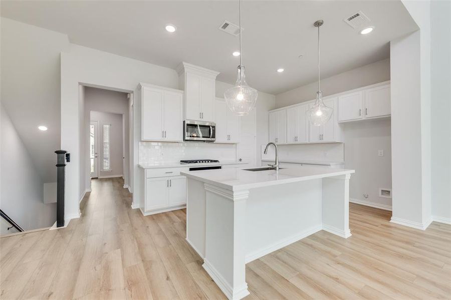 Furnished interior view inside a new home in Wade Settlement Townhomes, Frisco (Image 4). Furnished interior view inside a new home in Wade Settlement Townhomes, Frisco (Image 4).