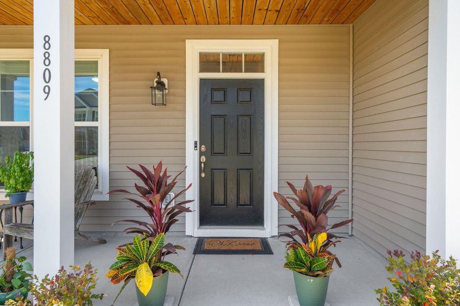 Front exterior of a new home in , Charleston, SC, highlighting curb appeal (Image 15).