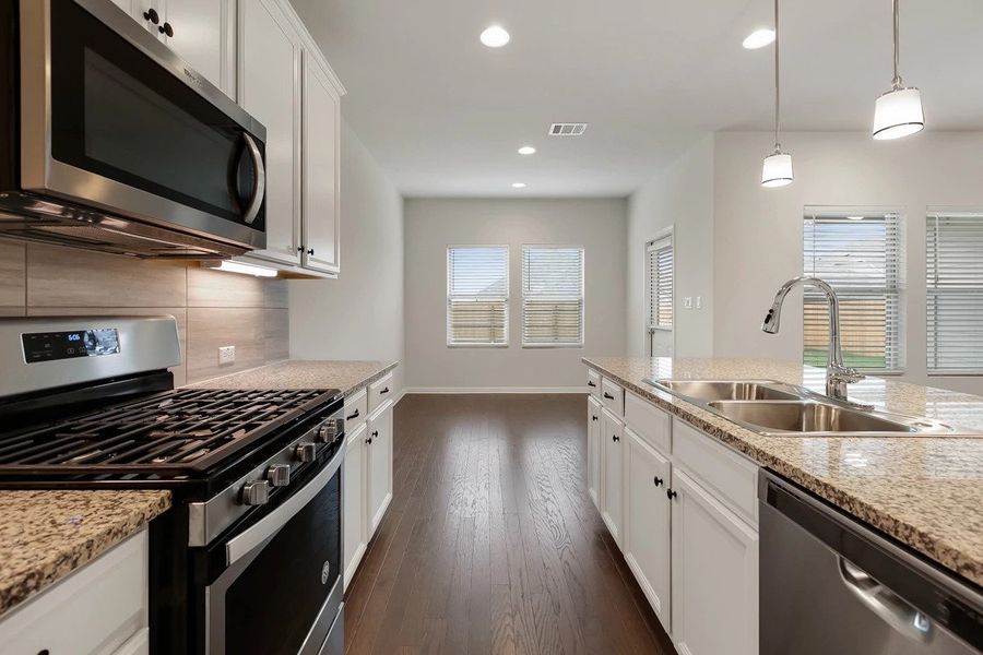 Representative furnished interior of a home built from the Cambridge by Ashton Woods in Lagos Reserve, Manor (Image 7). Representative furnished interior of a home built from the Cambridge by Ashton Woods in Lagos Reserve, Manor (Image 7).