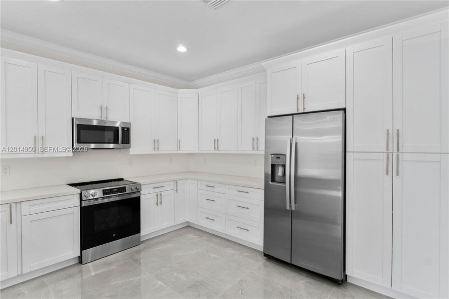 Kitchen with stainless steel appliances