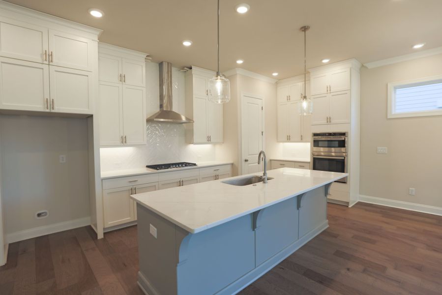 Representative furnished interior of a home built from the The Bennett by The Providence Group in Aberdeen, Hoschton (Image 5).