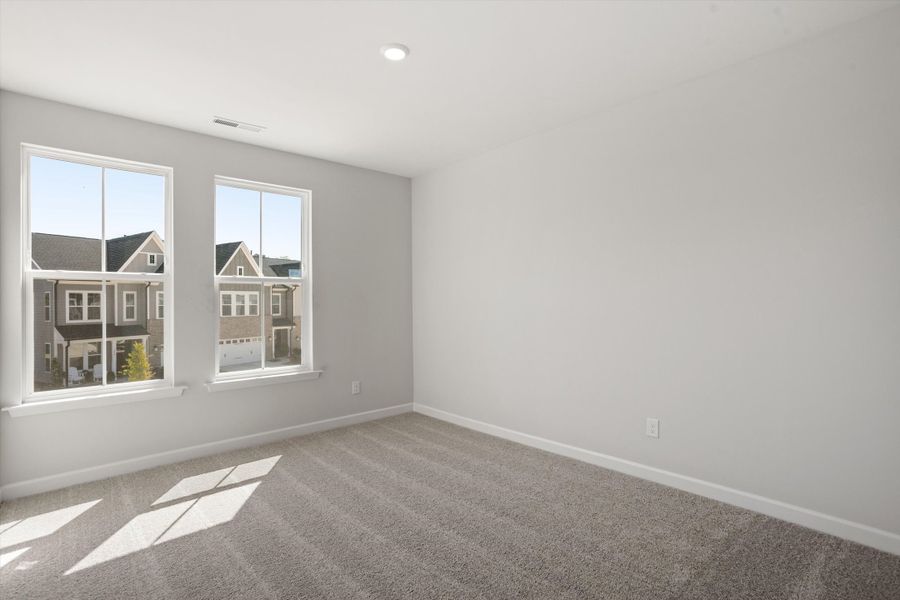Spacious, unfurnished interior of a new home in Ovation at Sweetbrier, Durham (Image 25).