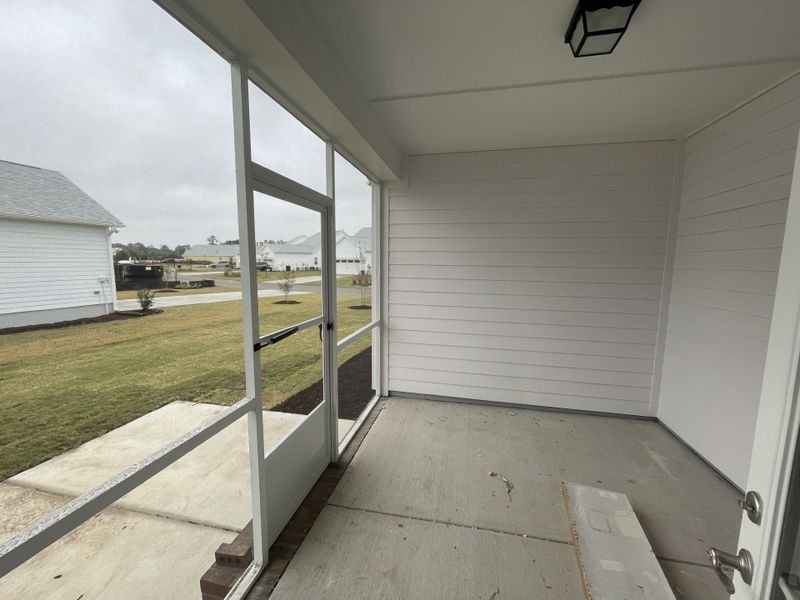 Exterior details and patio area of a home in The Sanctuary at Sunset Beach, Sunset Beach (Image 2).