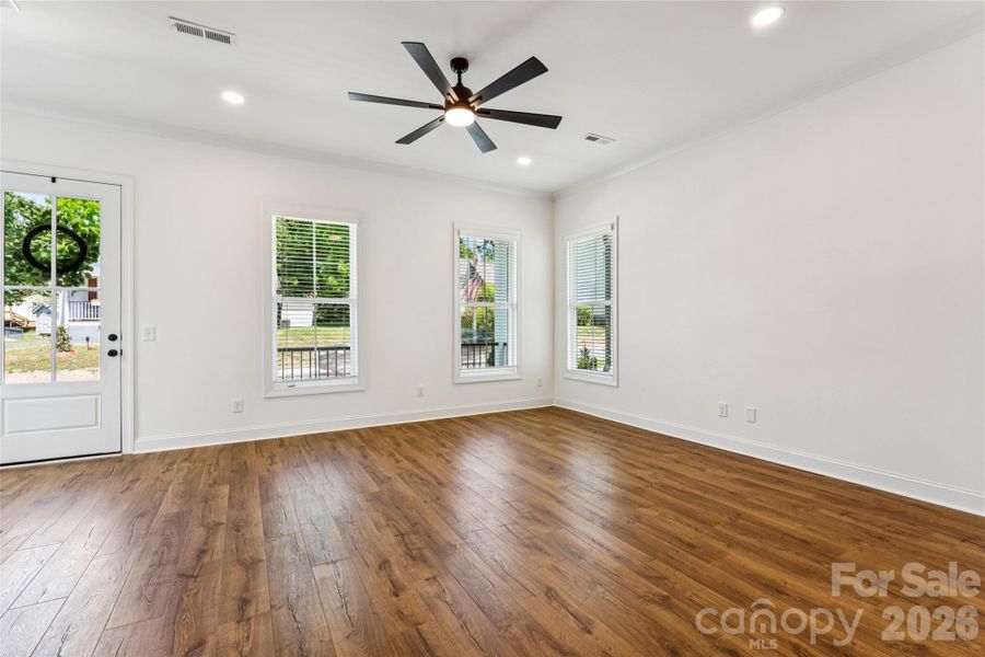 Tall ceilings, crown molding, tons of natural light!