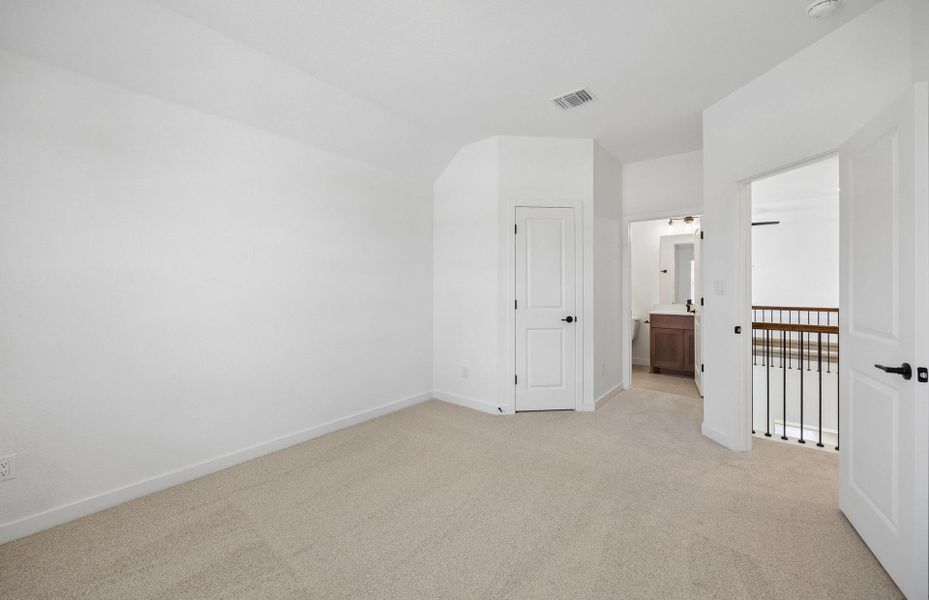 Representative unfurnished interior of a home built from the Wheeler by Pulte Homes in West Cypress Hills, Spicewood (Image 26).