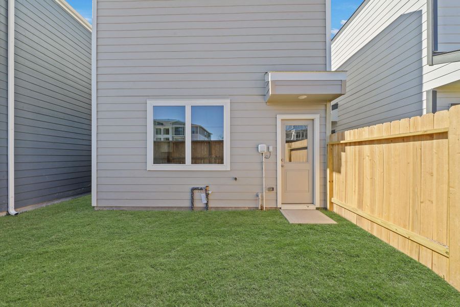 Exterior details and patio area of a home in Bridges on Lake Houston Villas, Humble (Image 4). Exterior details and patio area of a home in Bridges on Lake Houston Villas, Humble (Image 4).