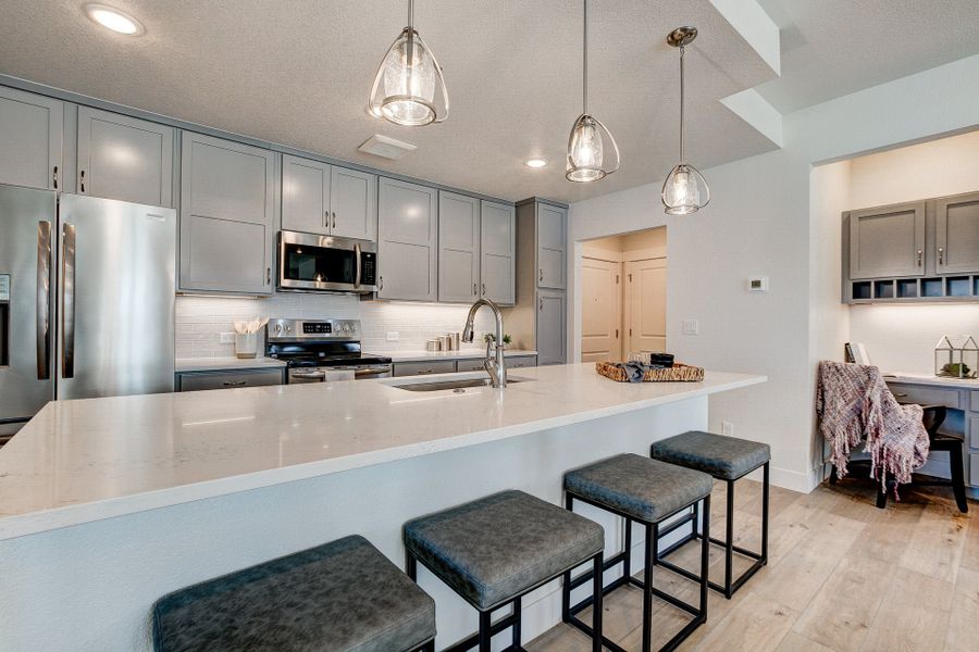 Representative furnished interior of a home built from the The Cambridge by Landmark Homes in The Lakes at Centerra, Loveland (Image 15).