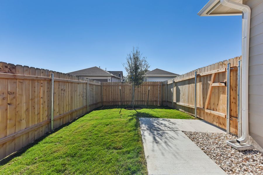 Exterior details and patio area of a home in Porter Country, Buda (Image 21).