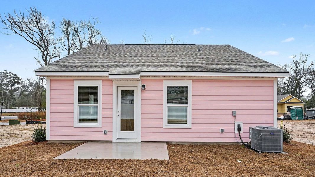 Exterior details and patio area of a home in Southshore Bay, Sunset Beach (Image 3).