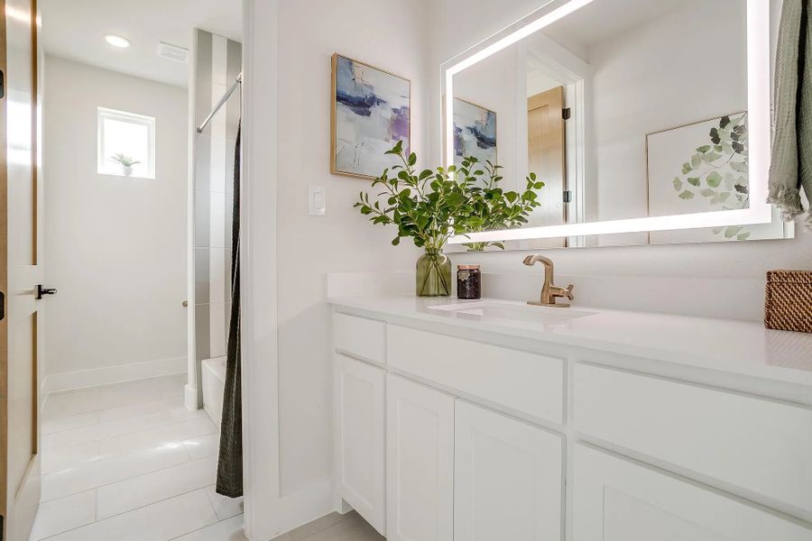 Representative furnished interior of a home built from the The Carley by Elmwood Custom Homes in Matthews Farm, Venus (Image 27).