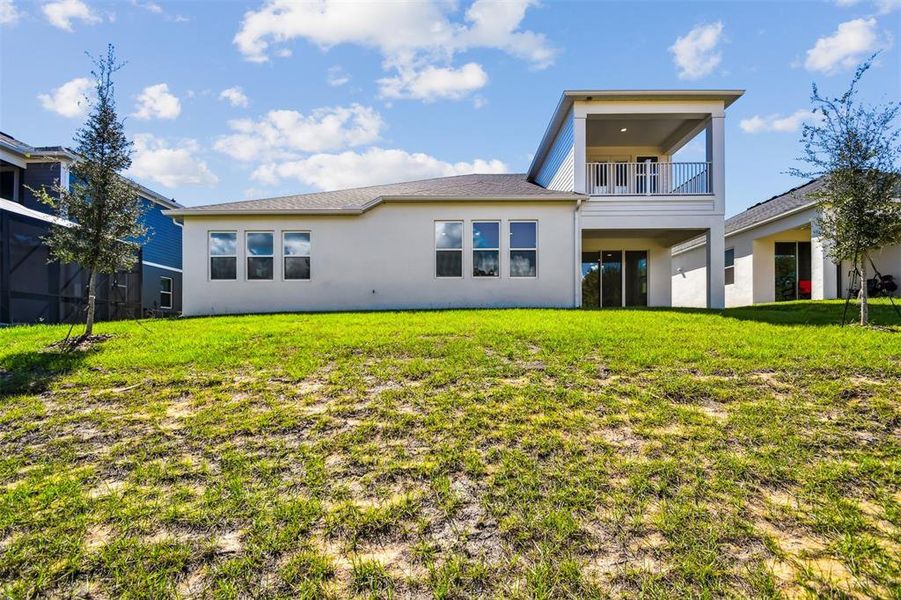 Exterior details and patio area of a home in Emerson Pointe, Apopka (Image 22).