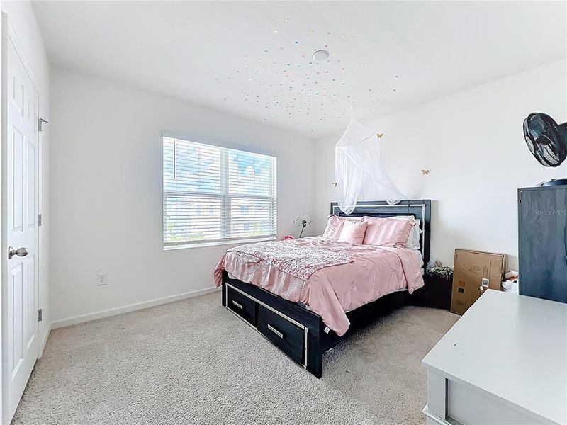 Furnished interior view inside a new home in Cypress Bay West, Palm Bay (Image 32).