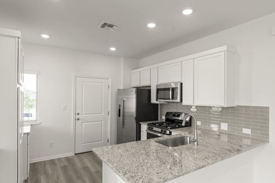 Representative furnished interior of a home built from the Frisco by Pacesetter Homes in Blanco Vista, San Marcos (Image 6).