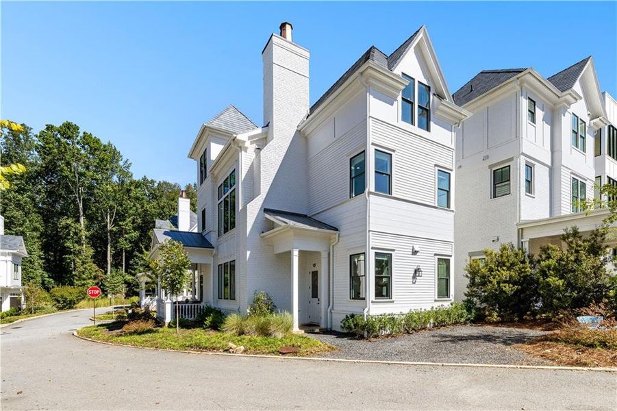 Front exterior of a new home in , Chattahoochee Hills, GA, highlighting curb appeal (Image 20).