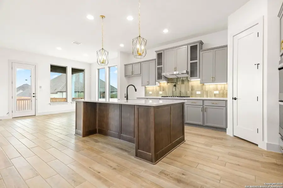 Furnished interior view inside a new home in Ventana - 70', Bulverde (Image 5).