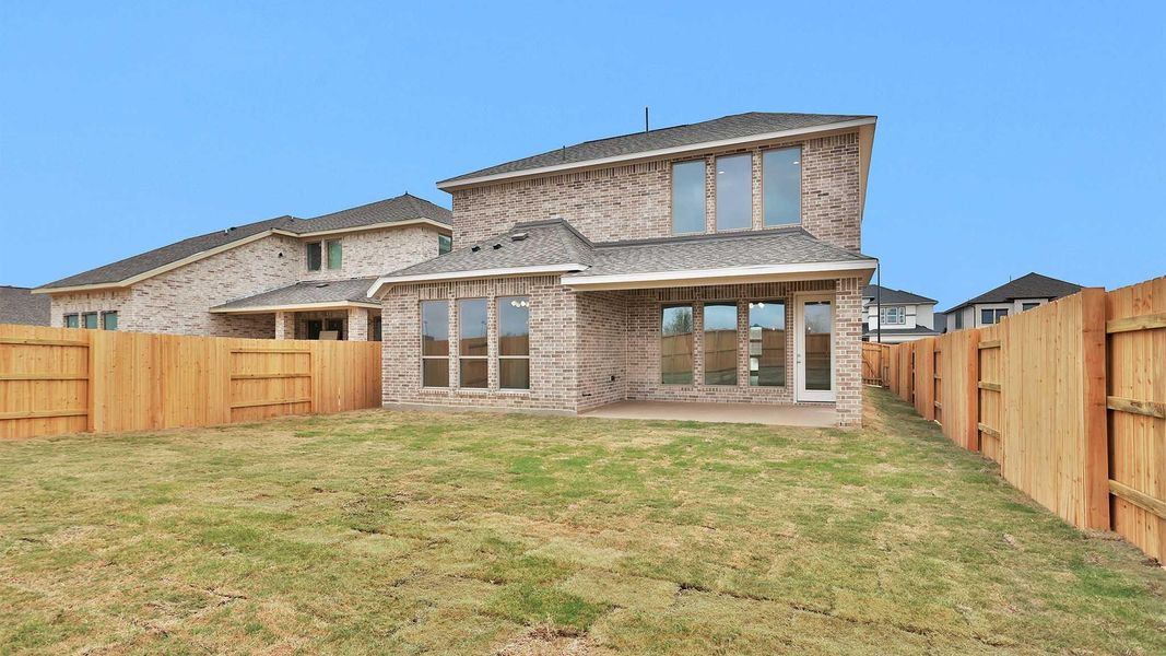 Exterior details and patio area of a home in Elyson, Katy (Image 4).