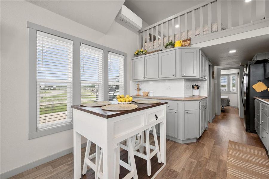 And you'll find the perfect spot for your coffee bar...which you can enjoy inside ...or take out and sip while you gaze out on the water!