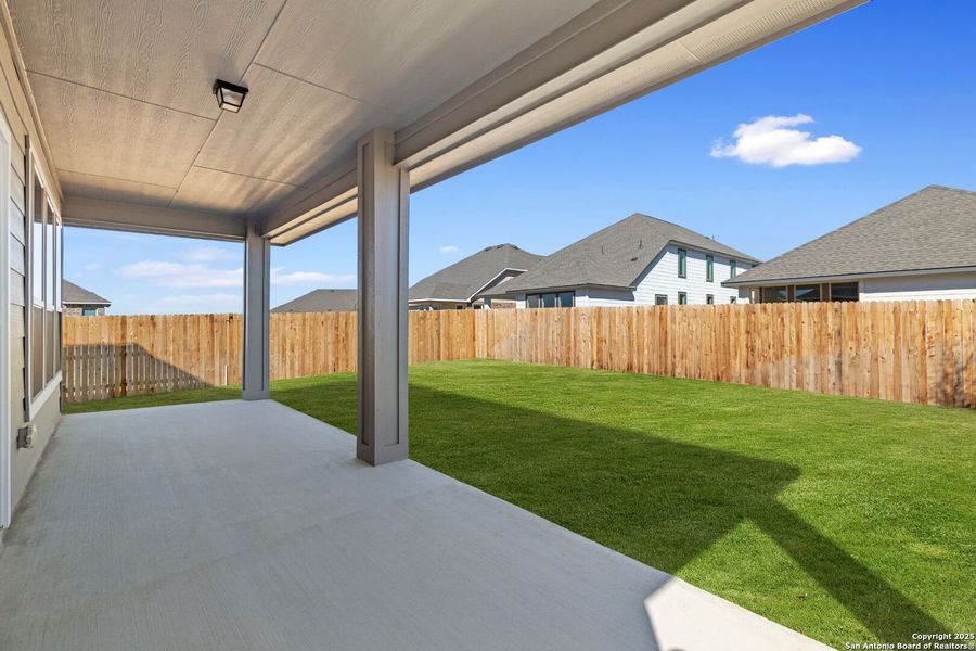 Front exterior of a new home in Megan's Landing, Castroville, TX, highlighting curb appeal (Image 15). Front exterior of a new home in Megan's Landing, Castroville, TX, highlighting curb appeal (Image 15).