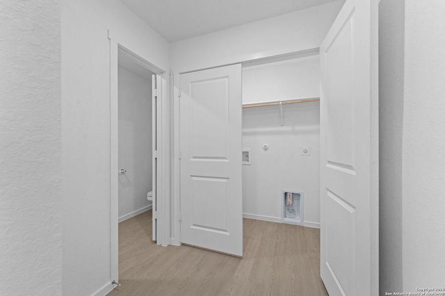 Spacious, unfurnished interior of a new home in Torian Village: Belmar Collection, San Antonio (Image 17).