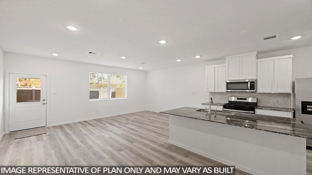 Furnished interior view inside a new home in Bridges on Lake Houston Villas, Humble (Image 7).