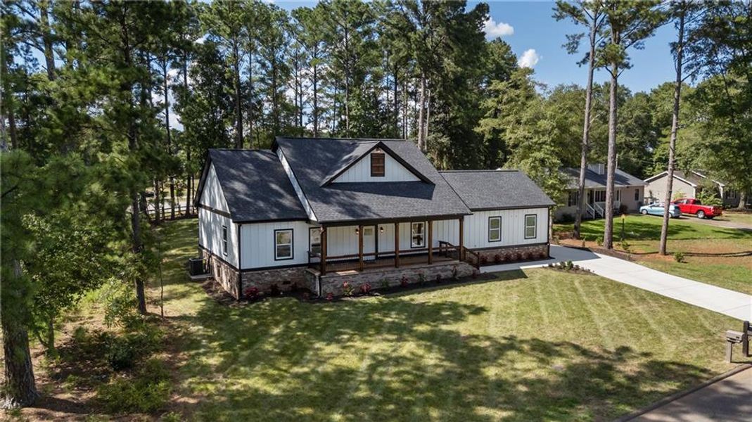 Front exterior of a new home in , Monroe, GA, highlighting curb appeal (Image 25). Front exterior of a new home in , Monroe, GA, highlighting curb appeal (Image 25).