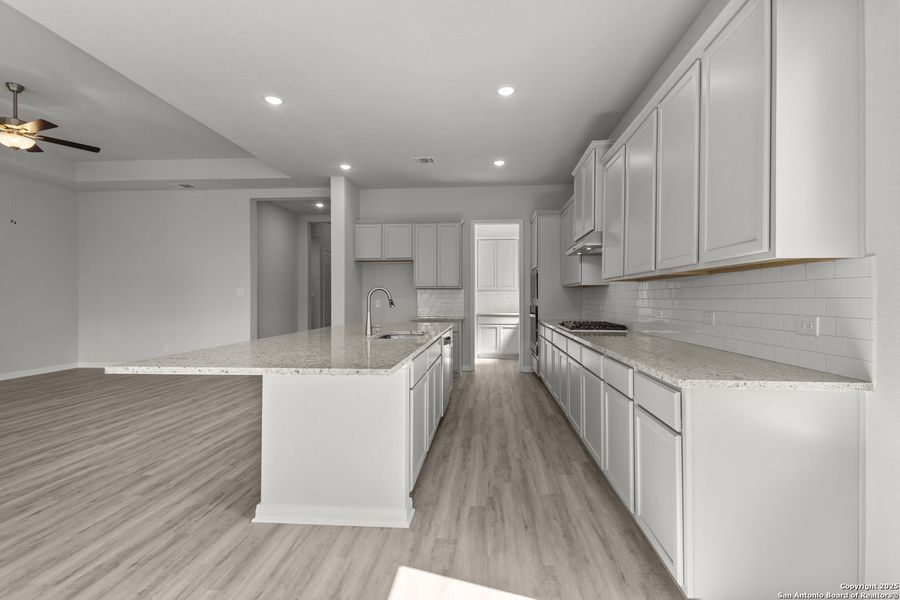 Furnished interior view inside a new home in Stillwater Ranch 60', San Antonio (Image 12).