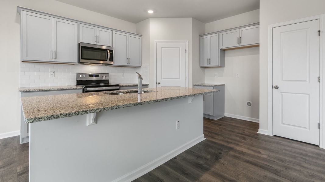 Furnished interior view inside a new home in The Grove at Matthews Landing, Fuquay Varina (Image 6).