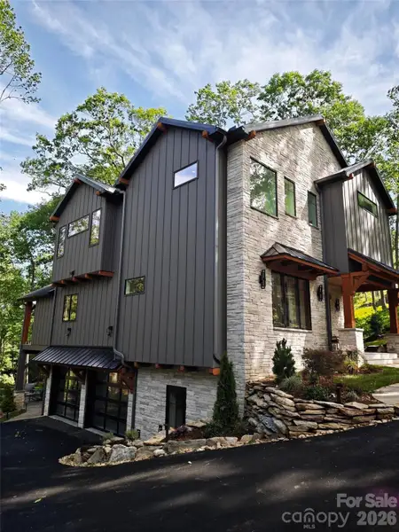 Front exterior of a new home in , Boone, NC, highlighting curb appeal (Image 2).