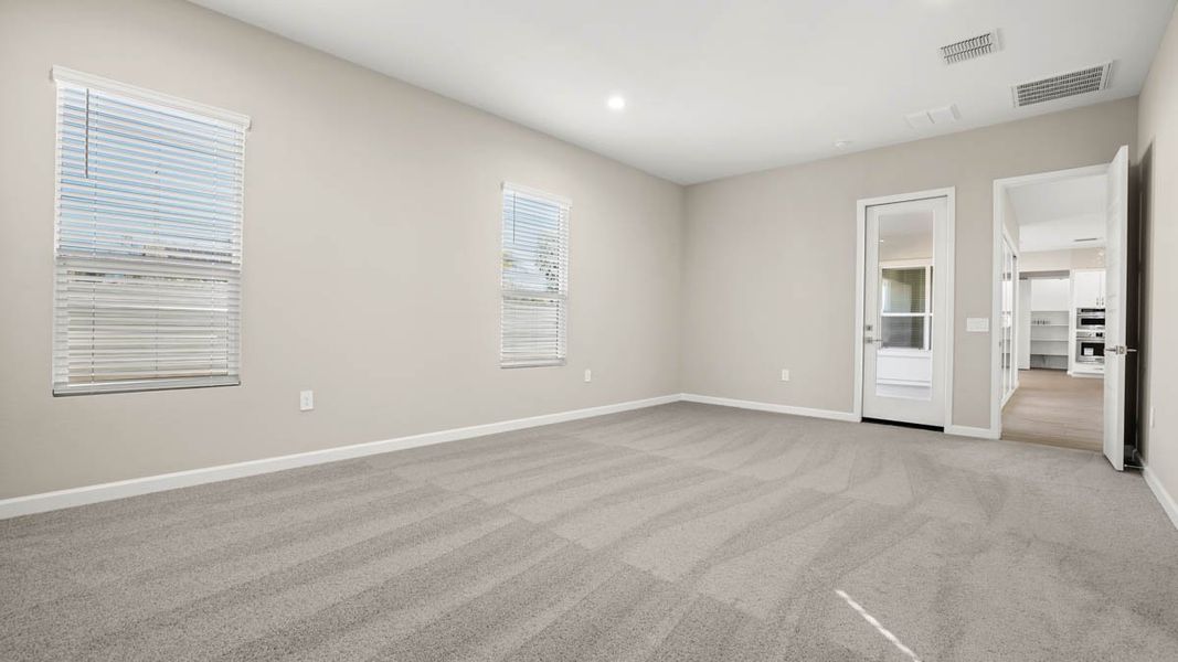 Spacious, unfurnished interior of a new home in Zanjero Pass, Waddell (Image 41).