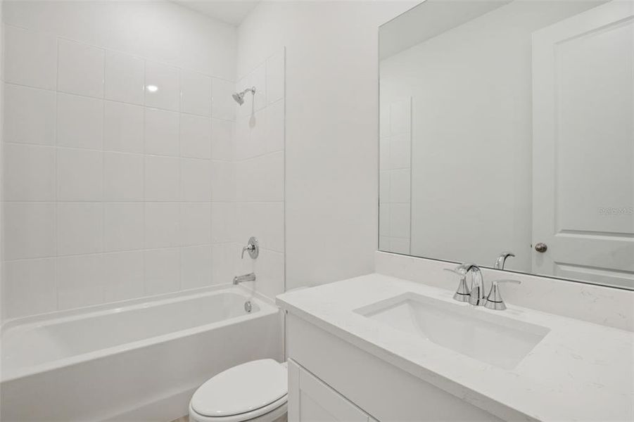 Furnished interior view inside a new home in Coasterra - Reserve Series, Palmetto (Image 14). Furnished interior view inside a new home in Coasterra - Reserve Series, Palmetto (Image 14).