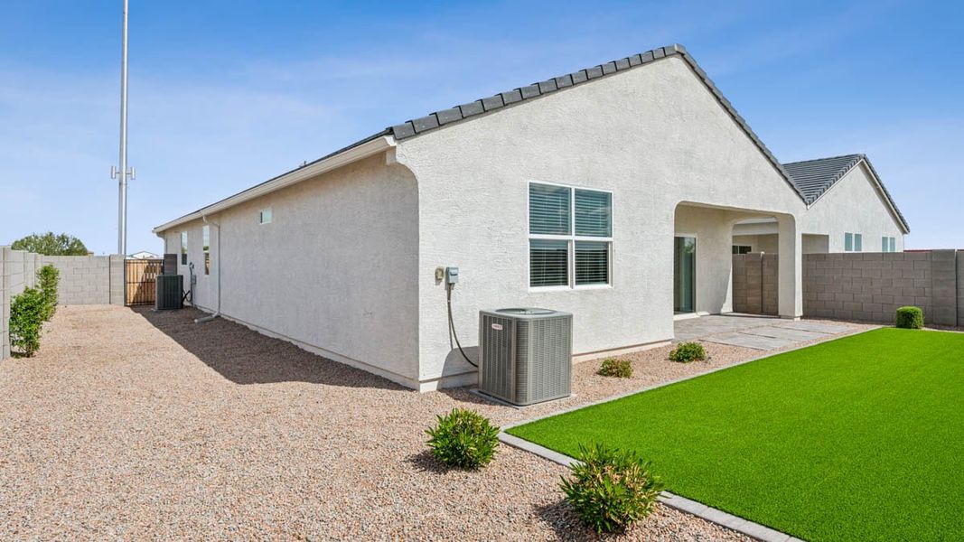 Exterior details and patio area of a home in Heartland Ranch, Coolidge (Image 25).