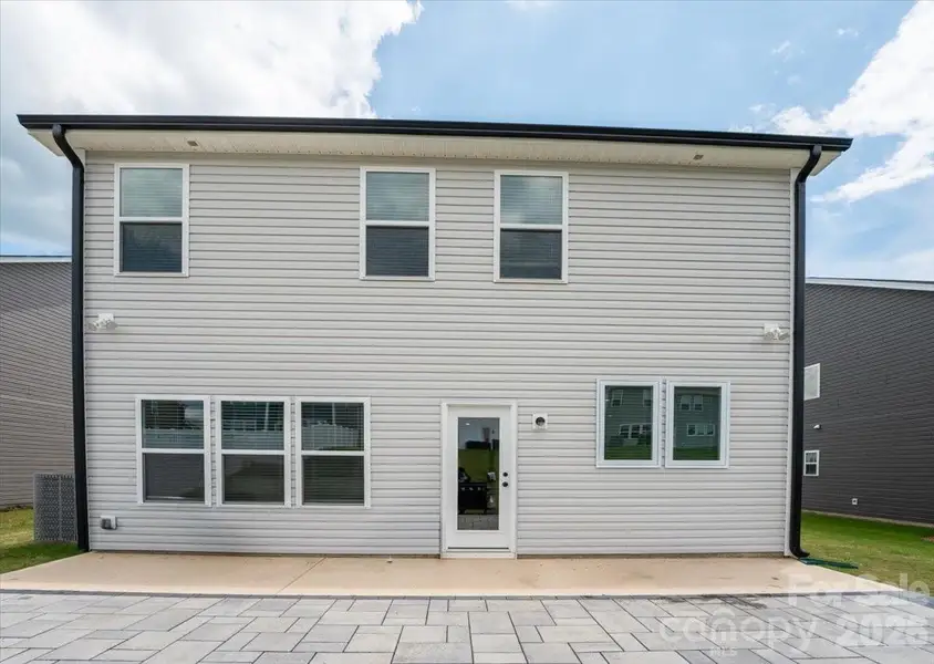Exterior details and patio area of a home in , Oakboro (Image 3).