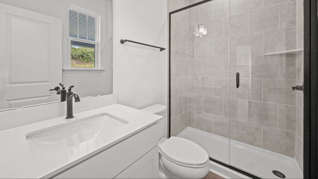 The Norris Plan by DRB Homes in McBride Indian Trail, NC - Bathroom 1