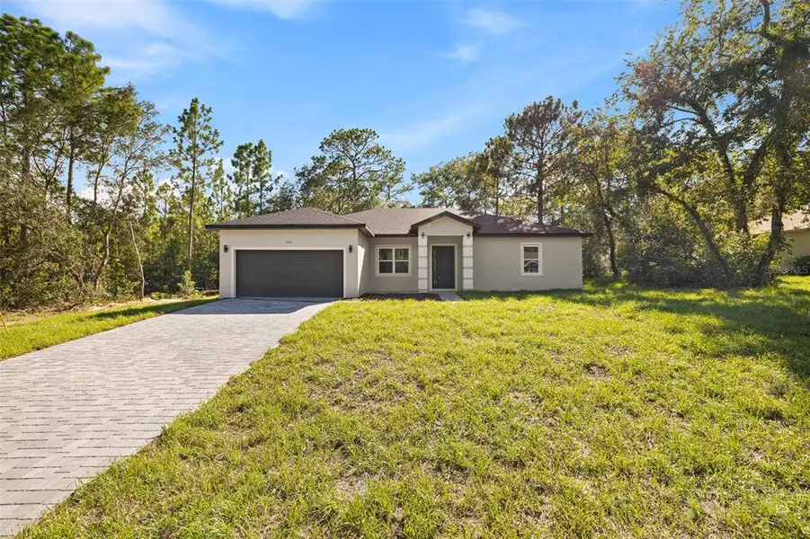Front exterior of a new home in , Dunnellon, FL, highlighting curb appeal (Image 2). Front exterior of a new home in , Dunnellon, FL, highlighting curb appeal (Image 2).