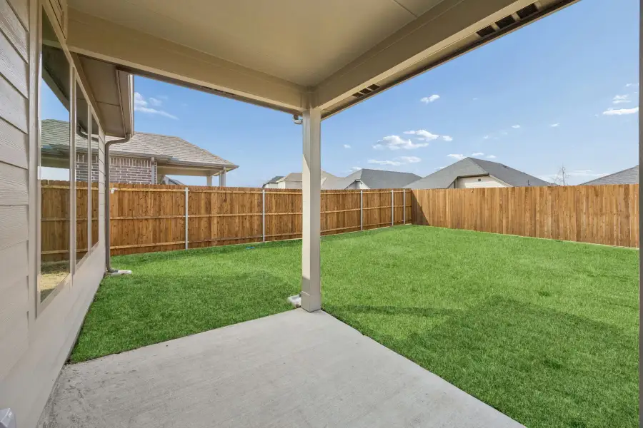 Covered Patio in the Stanley II home plan by Trophy Signature Homes – REPRESENTATIVE PHOTO Covered Patio in the Stanley II home plan by Trophy Signature Homes – REPRESENTATIVE PHOTO