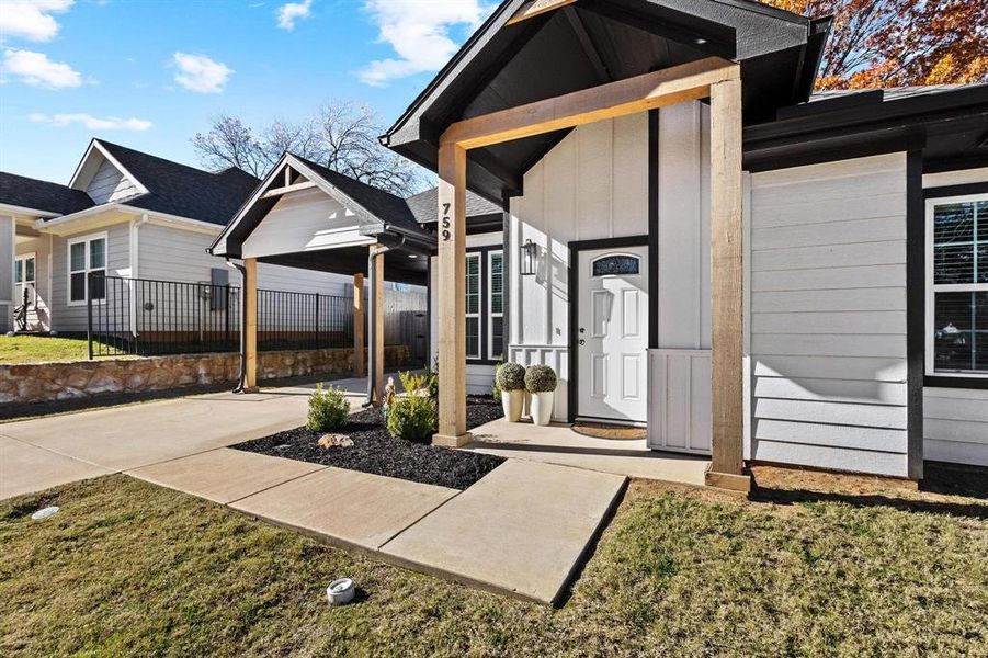 Exterior details and patio area of a home in , Denison (Image 3). Exterior details and patio area of a home in , Denison (Image 3).