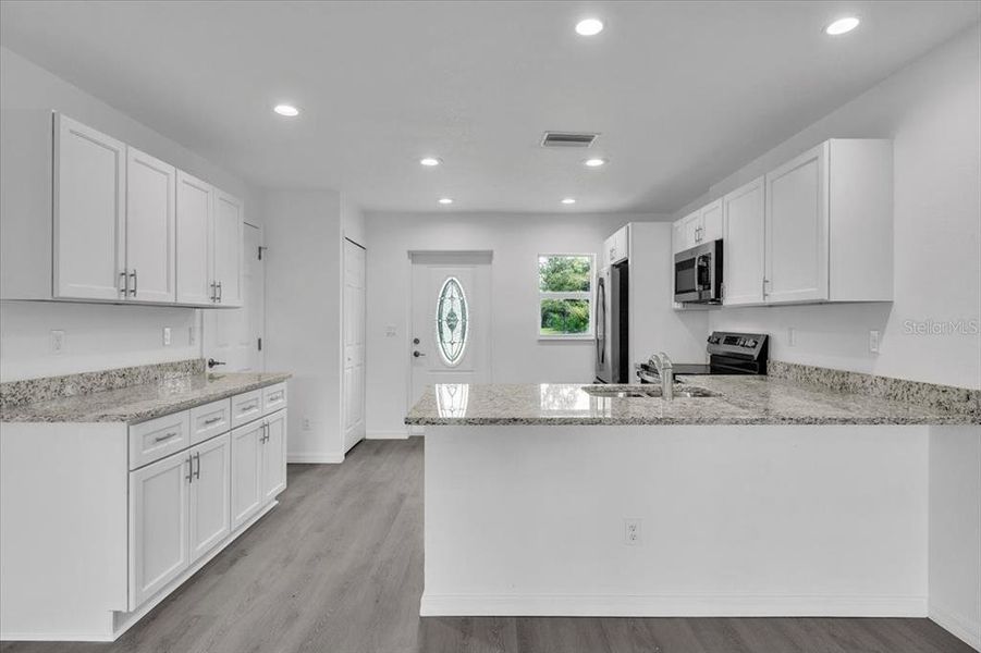 Furnished interior view inside a new home in , Punta Gorda (Image 6).
