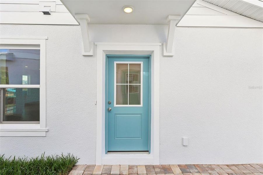 Exterior details and patio area of a home in Cyrene at Harmony, St. Cloud (Image 4).