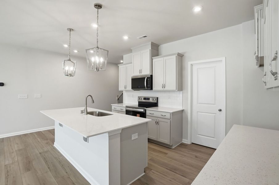 Furnished interior view inside a new home in Stonesummit at Reedy Creek, Charlotte (Image 6).