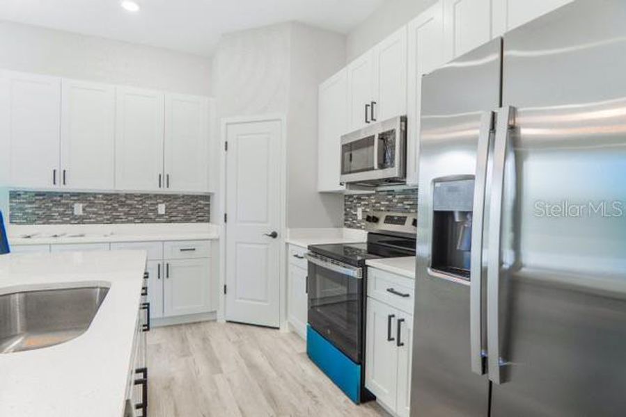 Furnished interior view inside a new home in , Ocala (Image 11). Furnished interior view inside a new home in , Ocala (Image 11).