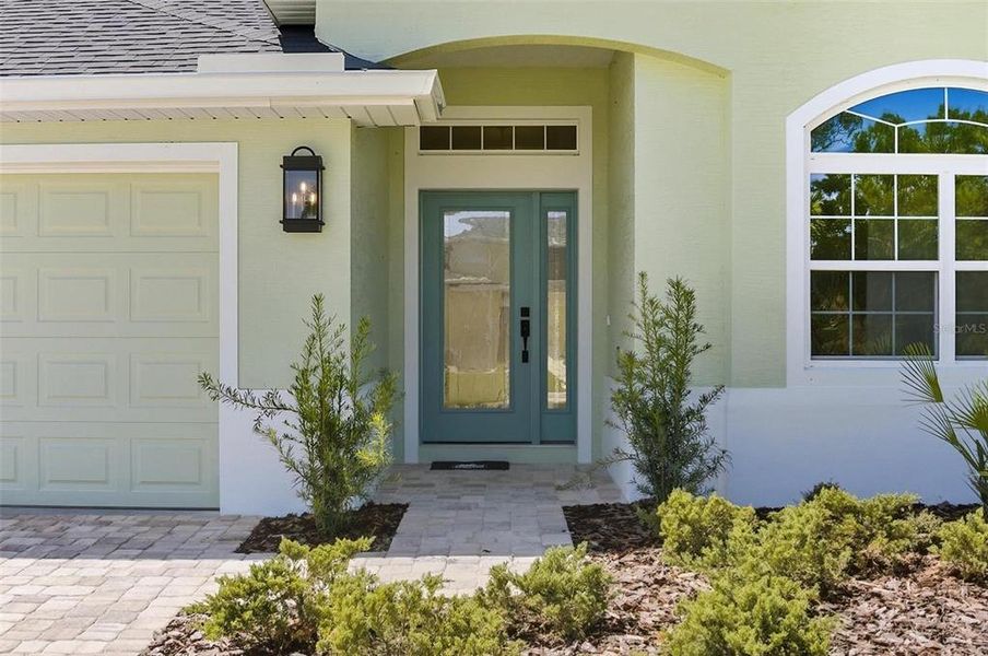 Exterior details and patio area of a home in Matanzas Cove, Palm Coast (Image 1).