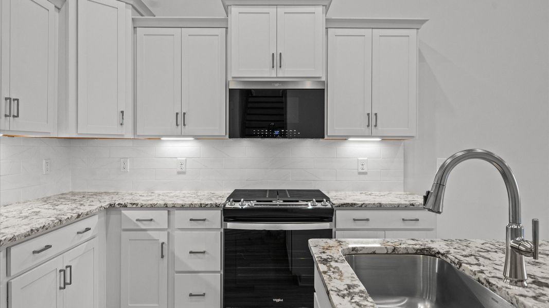 Furnished interior view inside a new home in Camden Cottages, Greenville (Image 11).