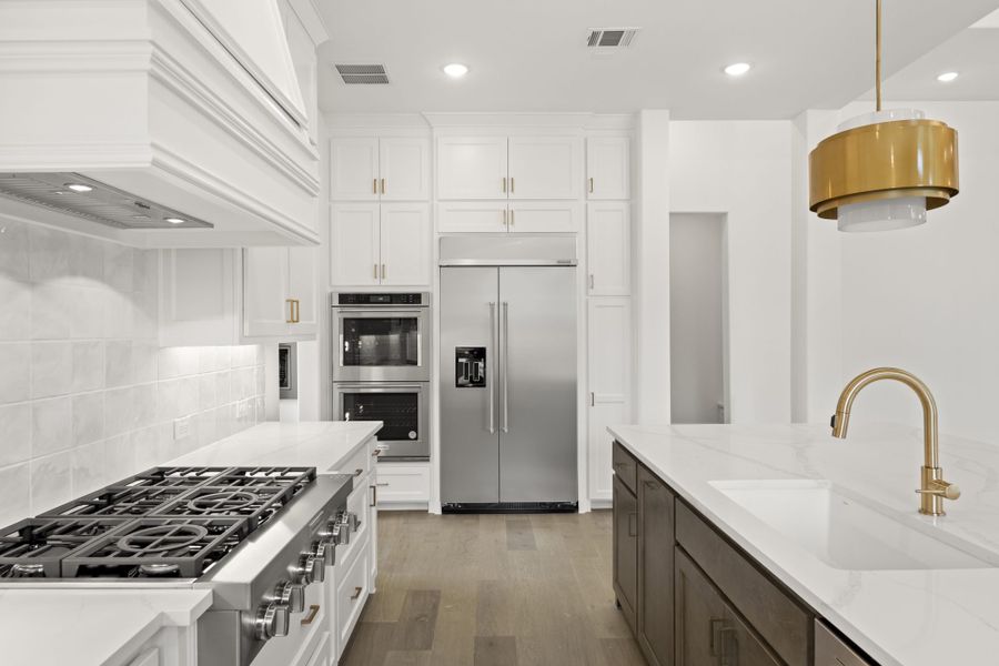 Representative furnished interior of a home built from the 7042 by Tradition Homes in Mustang Lakes, McKinney (Image 7).