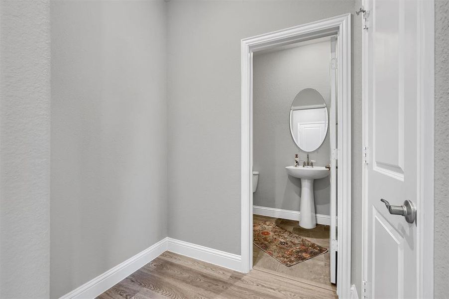 Bathroom featuring wood-type flooring