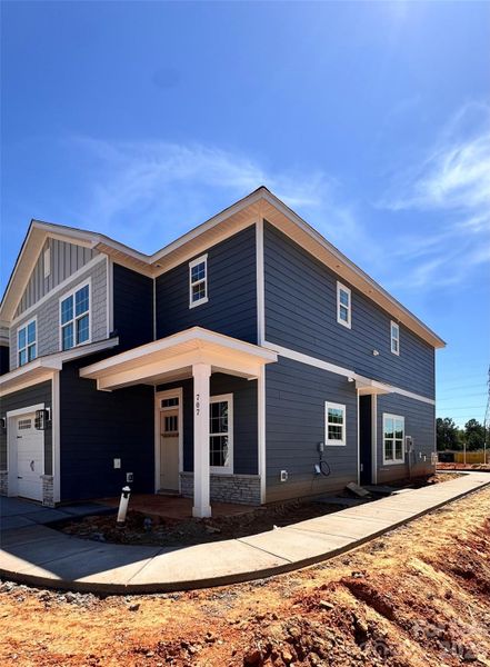 Rear load garage and entrance.  End Unit has side entrance.