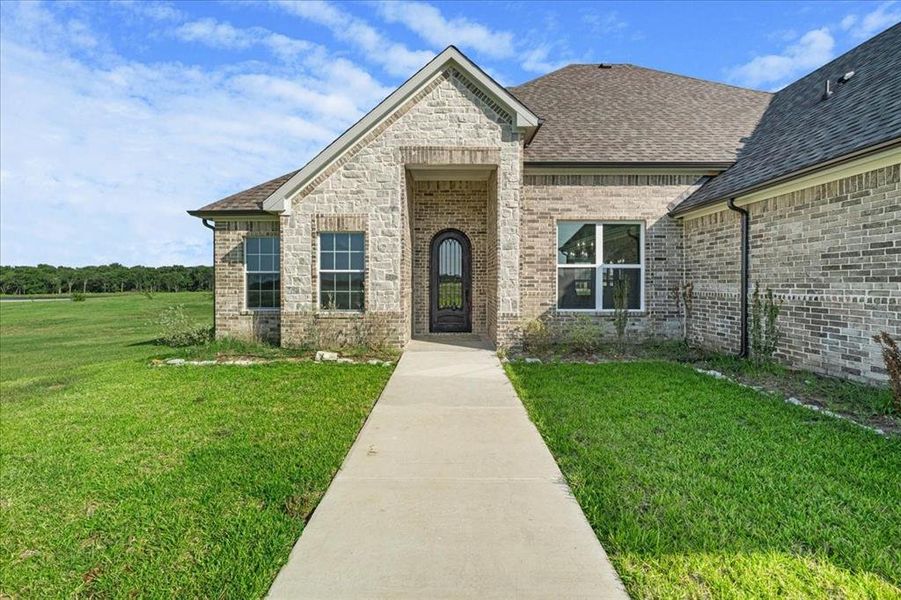 Exterior details and patio area of a home in , Corsicana (Image 21). Exterior details and patio area of a home in , Corsicana (Image 21).