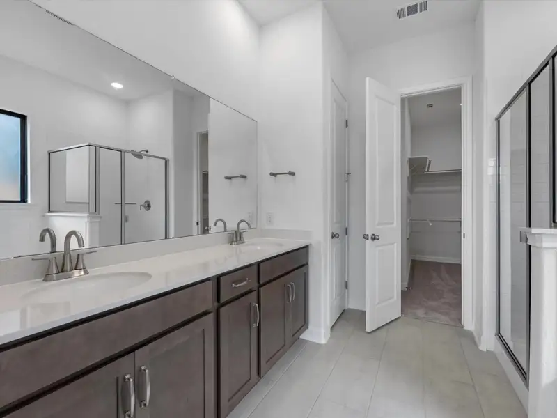 Primary Bathroom. Sample product photo. Actual exterior and interior selections may vary by homesite. Photo may be virtually staged.